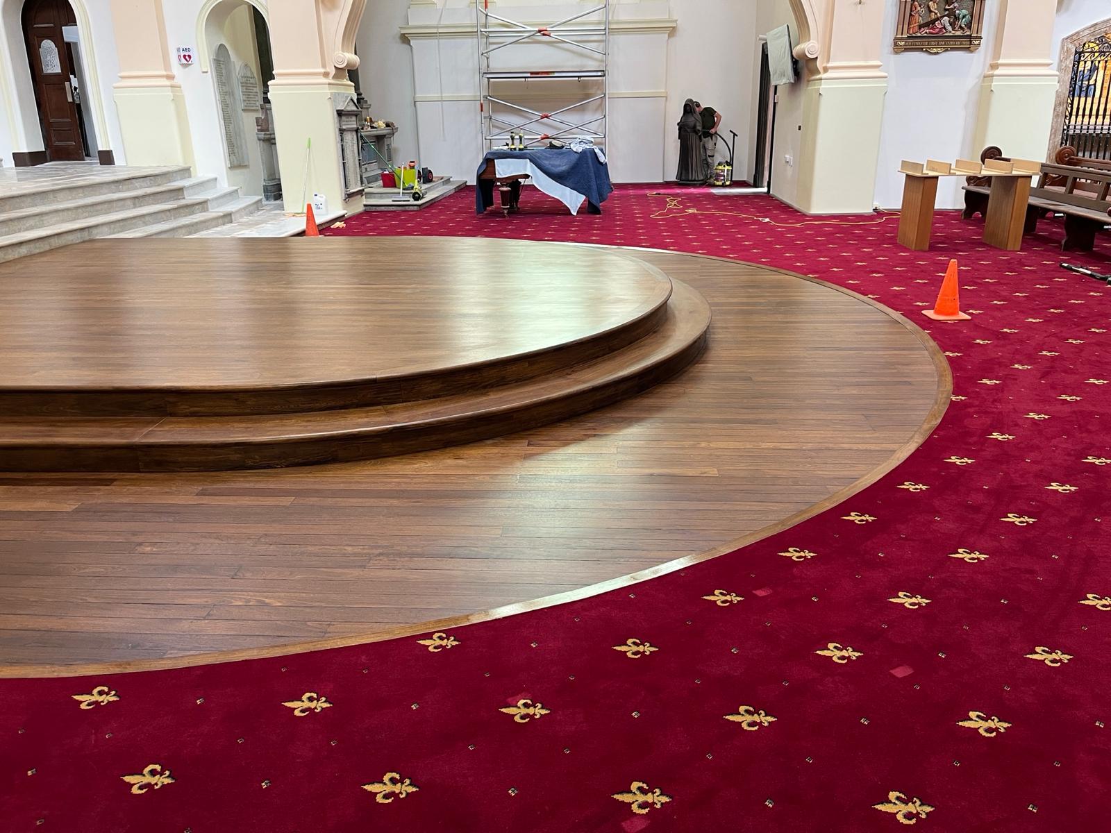 Synteko Hardwax Oil roll in a church in Sydney on tallowwood timber over a oil based stain