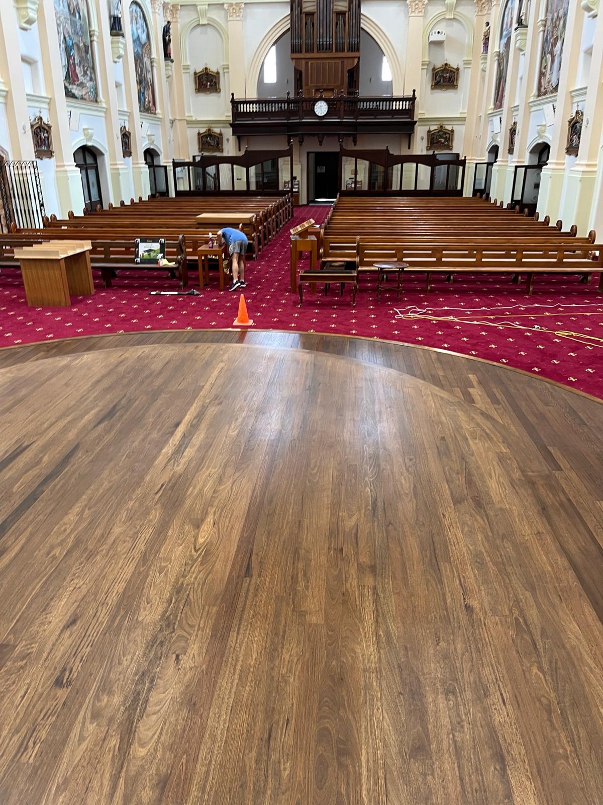 Synteko Hardwax Oil roll in a church in Sydney on tallowwood timber over a oil based stain